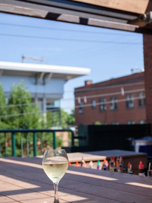 Outside seating on the deck at Mario's East Side
